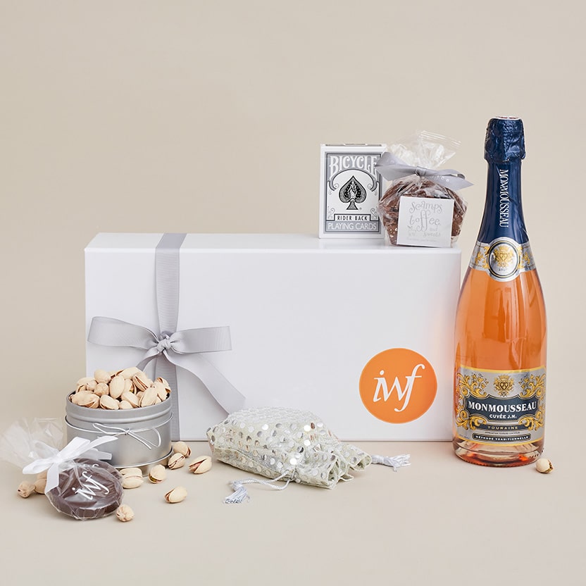 IWF gift box with custom branded chocolate, nuts, playing cards and drinks